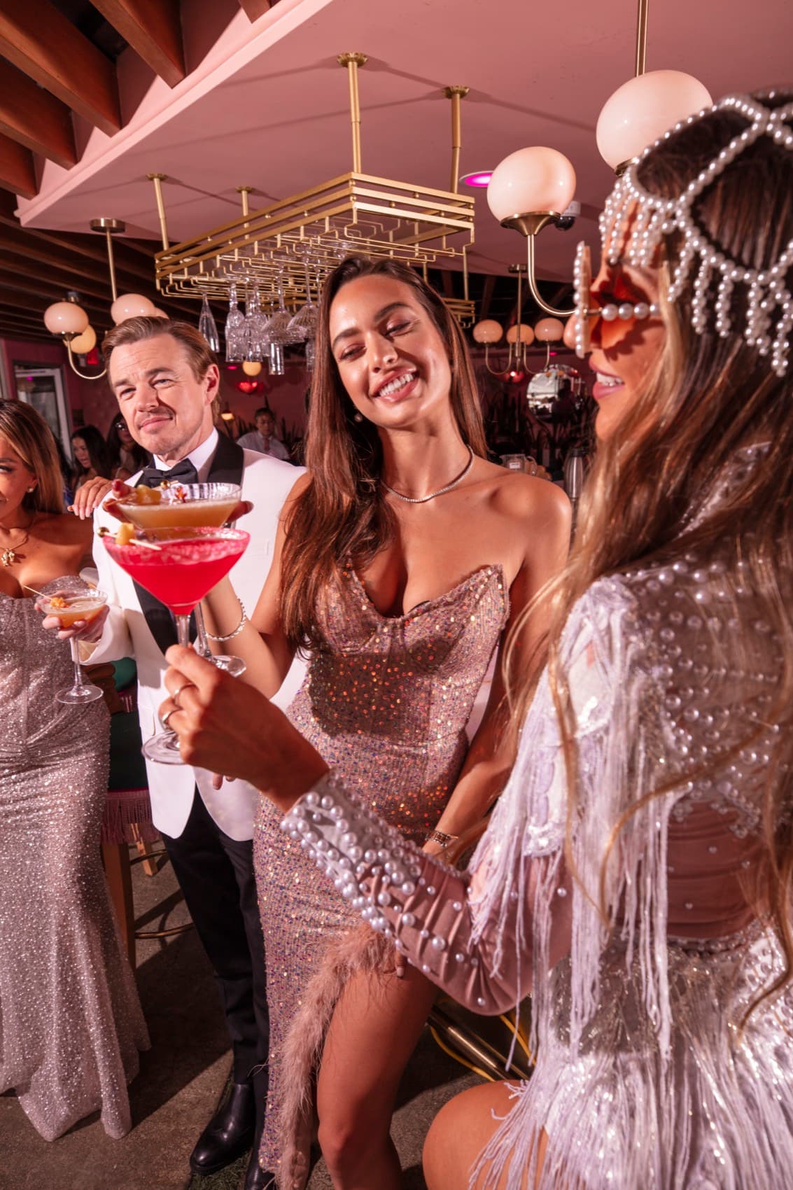 Cocktails, sequins, and pure Nigel's energy at the bar