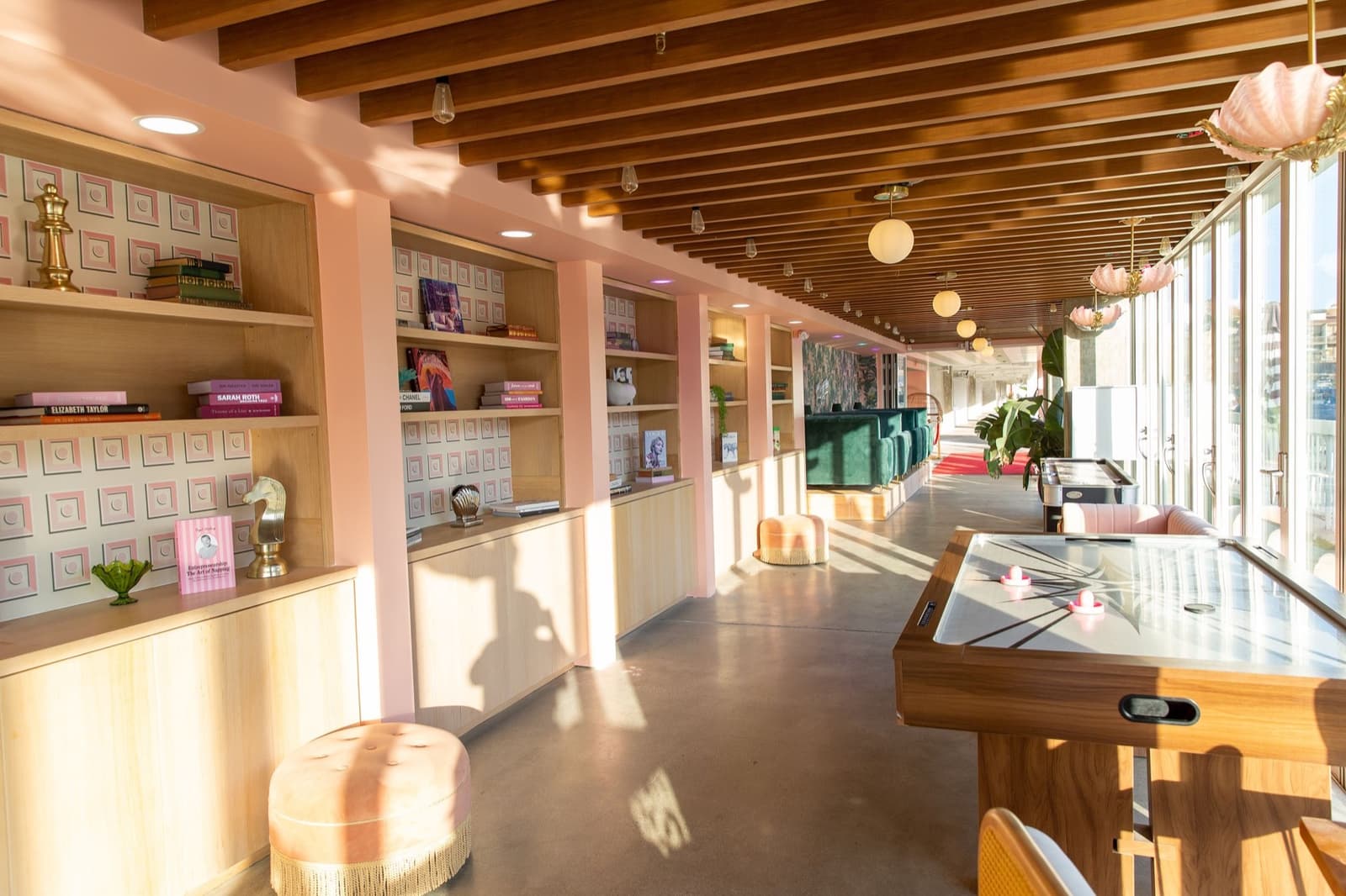 The sunlit waterfront promenade at Nigel's Waterfront Restaurant